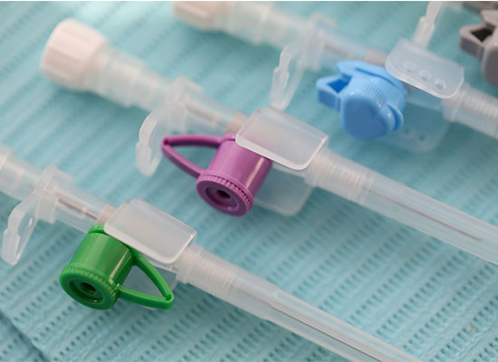 Plastic medical catheters in a row